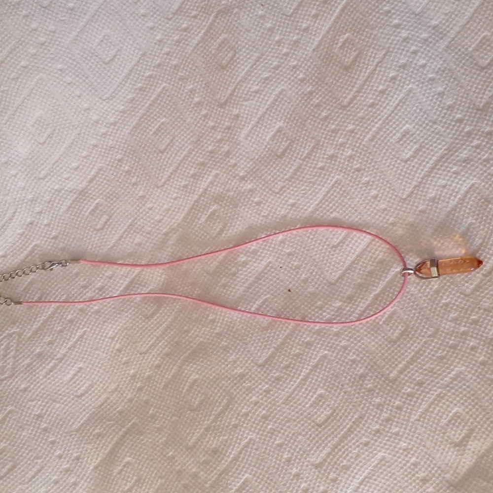 Clear pink bullet pendant